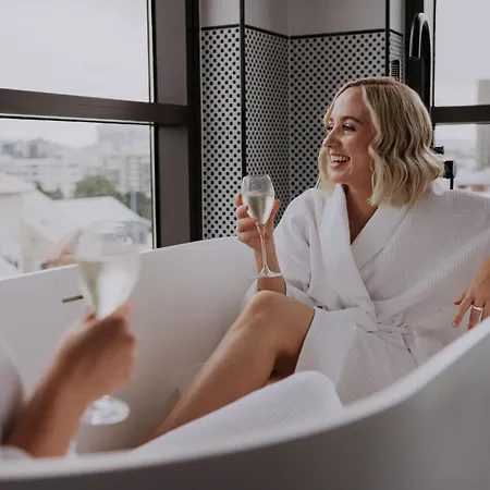 Hotel X Brisbane Fortitude Vly, Vignette Collection By Ihg Fortitude Valley Exterior photo A woman in a bathrobe